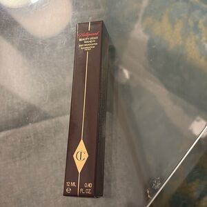 NIB Charlotte Tilbury Hollywood Beauty Light Wand highlighter in “spotlight”